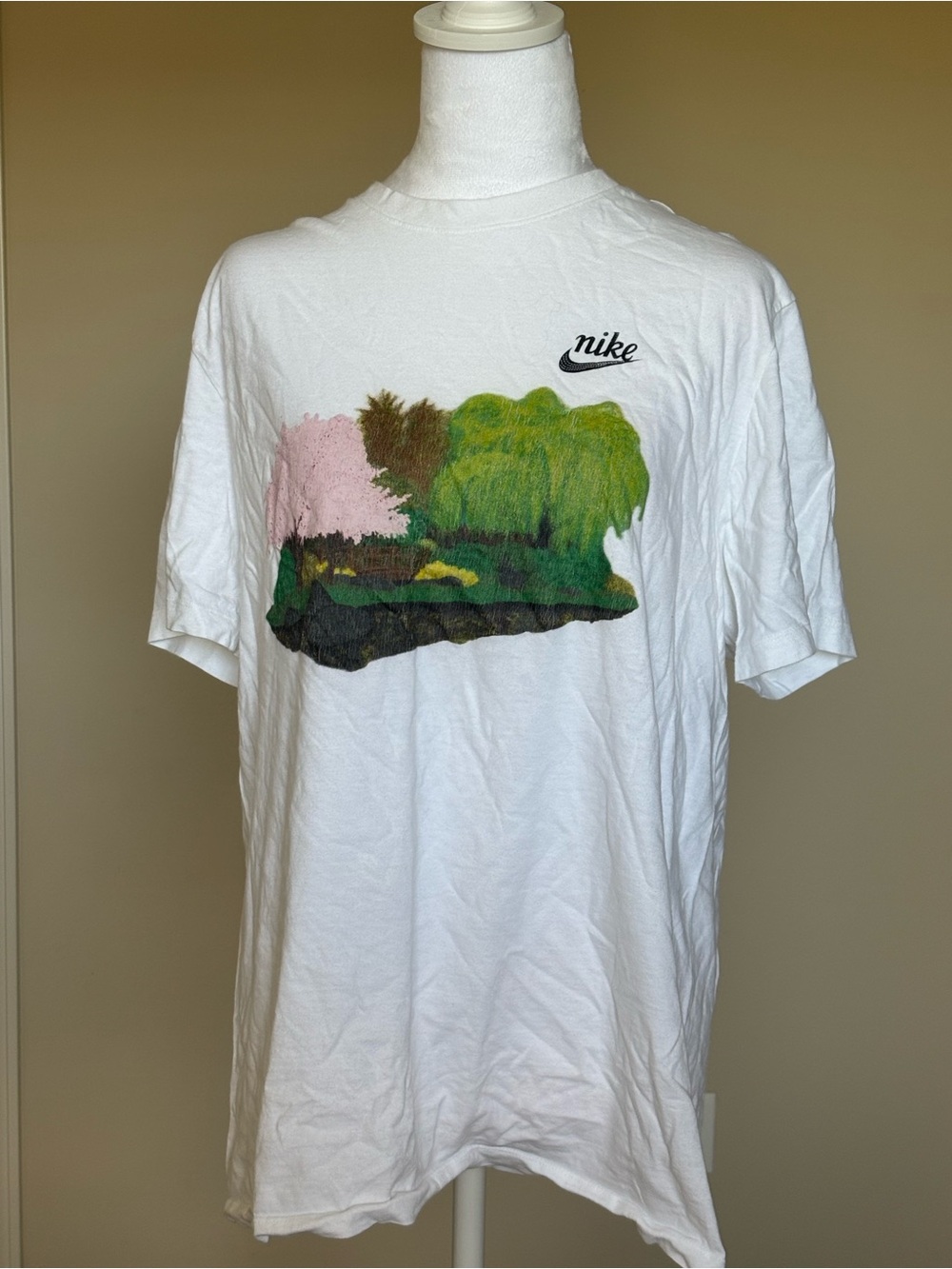 Nike White Short-Sleeve Tee with Green and Pink Landscape Graphic